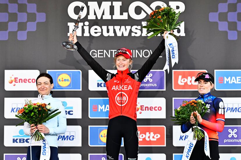 Polish Aurela Nerlo of Winspace Orange Seal, Belgian Lotte Claes of Arkea - B&B Hotels Women and Dutch Demi Vollering of FDJ-Suez celebrate on the podium of the women's one-day cycling race Omloop Het Nieuwsblad (UCI World Tour), 137,9km from Gent to Ninove, Saturday 01 March 2025. BELGA PHOTO DIRK WAEM