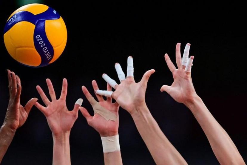 This picture shows the hand of Brazil's Fernanda Rodrigues (L) hitting the ball in the women's quarter-final volleyball match between Brazil and Russia during the Tokyo 2020 Olympic Games at Ariake Arena in Tokyo on August 4, 2021.  PEDRO PARDO / AFP