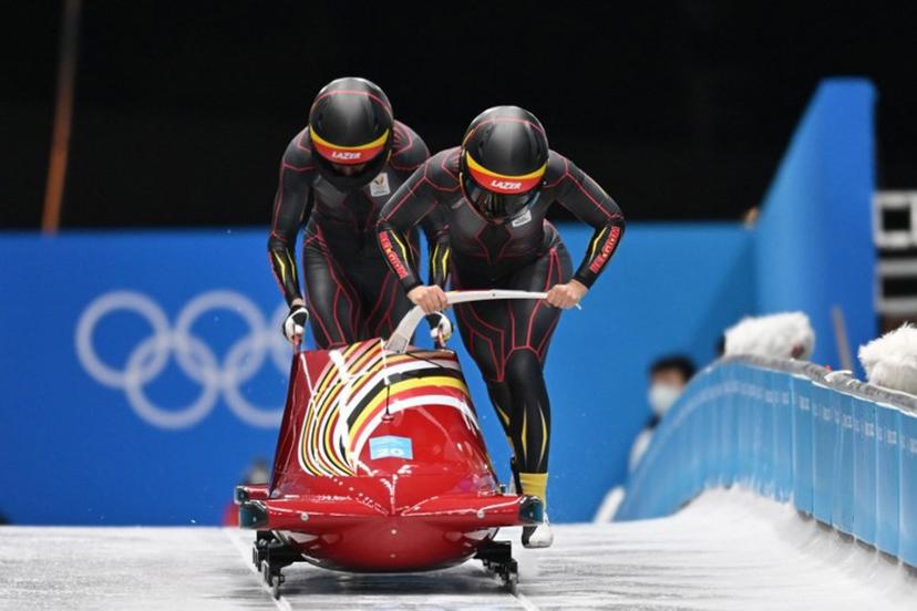 Belgium's An Vannieuwenhuyse and Sara Aerts compete in the 2-woman bobsleigh event at the Yanqing National Sliding Centre during the Beijing 2022 Winter Olympic Games in Yanqing on February 18, 2022.  Daniel MIHAILESCU / AFP