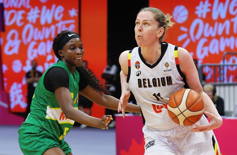Mali's Djeneba N'Daiye and Belgium's Emma Meesseman fight for the ball during a basket game between Belgium's national team Belgian Cats and Mali, in Wuhan, China, on Saturday 14 March 2026, the third game (out of 5) of the qualifications phase for the World Cup Basket tournament. BELGA PHOTO NIKOLA KRSTIC