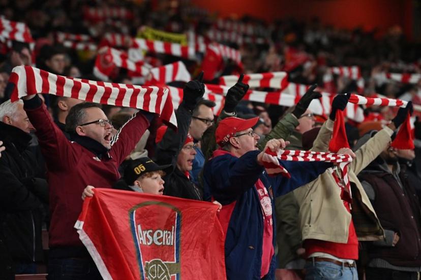Arsenal fans sing in the crowd ahead of the English Premier League football match between Arsenal and Aston Villa at the Emirates Stadium in London on January 18, 2025.   Glyn KIRK / AFP