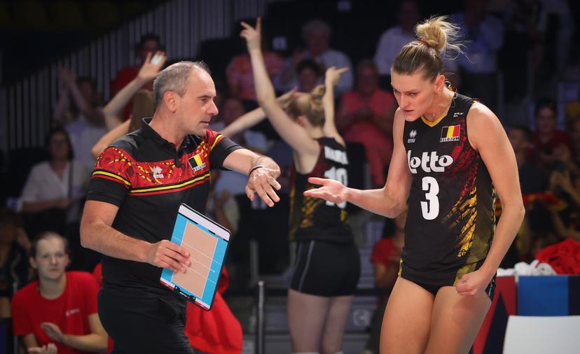Belgium's head coach Kris Vansnick and Belgium's Britt Herbots celebrate during a volleyball game between Poland and the Belgian national women volleyball team Yellow Tigers in the group stage of the 2023 European Women's Championships, Tuesday 22 August 2023 in Gent. The 2023 European Women's Championships take place from August 15 to September 3. BELGA PHOTO VIRGINIE LEFOUR