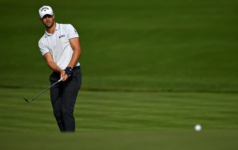 Belgium's Thomas Detry chips onto the 12th green on day three of the BMW PGA Championship at Wentworth Golf Club, south-west of London, on September 16, 2023.  Glyn KIRK / AFP