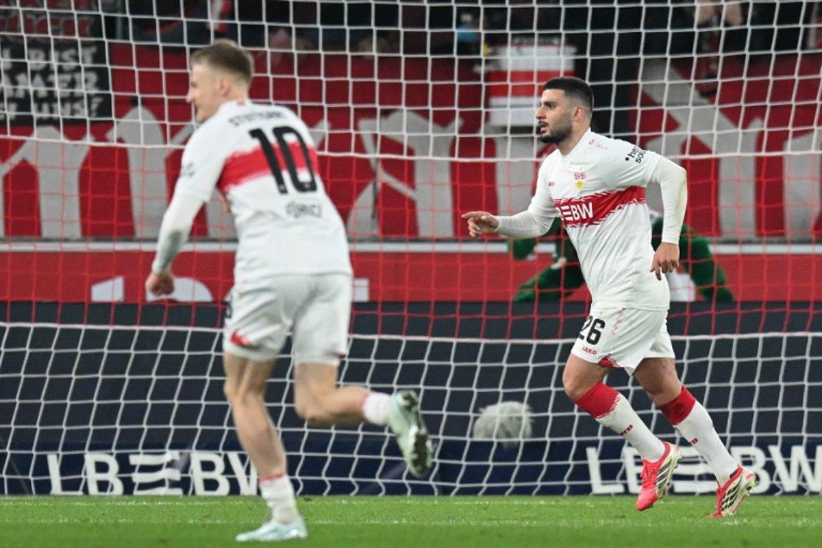 Stuttgart's German forward #26 Deniz Undav (R) celebrates scoring the opening goal with his teammates during the German first division Bundesliga football match between VfB Stuttgart and RB Leipzig in Stuttgart, southern Germany, on March 15, 2026.  THOMAS KIENZLE / AFP