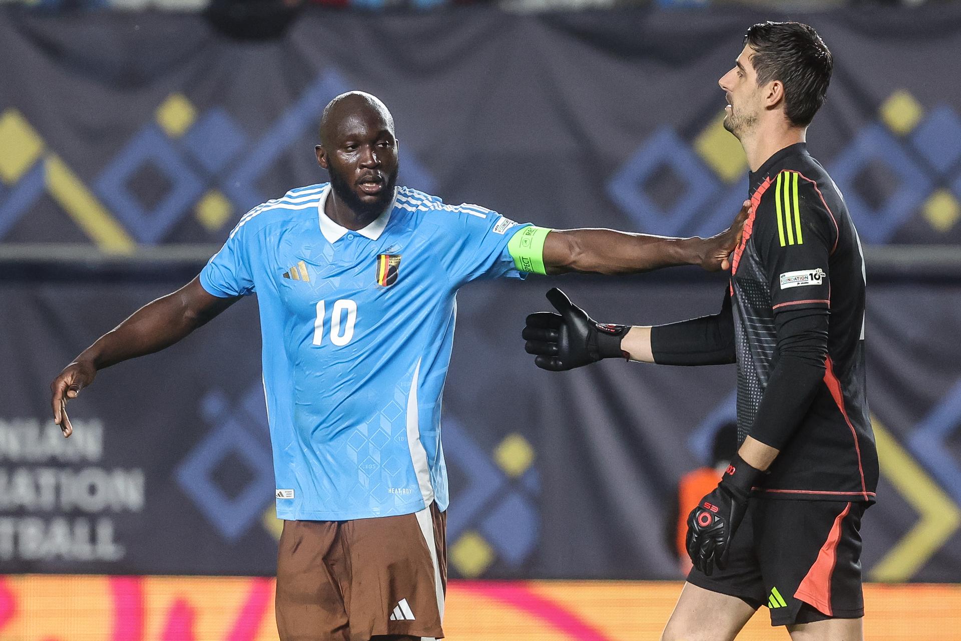 Belgium's Romelu Lukaku and Belgium's goalkeeper Thibaut Courtois pictured during a soccer game between Belgian national team the Red Devils and Ukraine, Thursday 20 March 2025 in Murcia, Spain, the first leg of the play-offs in the Nations League. BELGA PHOTO VIRGINIE LEFOUR