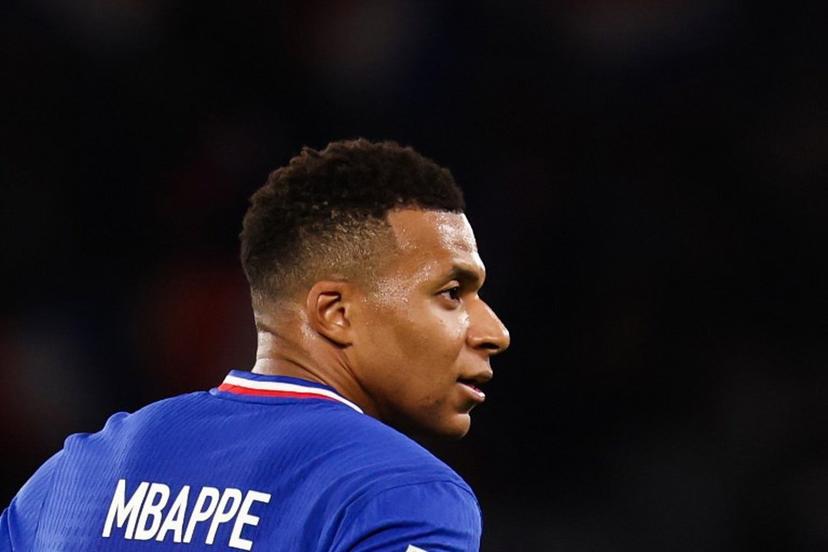 France's forward #10 Kylian Mbappe reacts during the 2026 World Cup qualifiers Europe zone group D football match between France and Ukraine at the Parc des Princes stadium in Paris, on November 13, 2025.   FRANCK FIFE / AFP