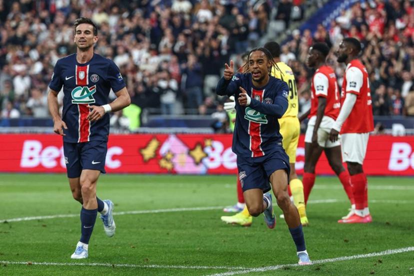 Paris Saint-Germain's French forward #29 Bradley Barcola (R) celebrates after scoring his team's second goal during the French Cup final football match between Paris Saint-Germain (PSG) and Stade de Reims at the Stade de France in Saint-Denis, north of Paris, on May 24, 2025.   Franck FIFE / AFP