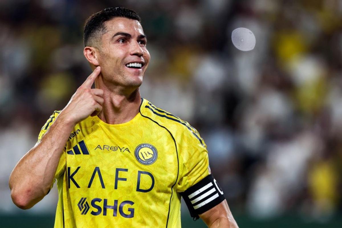 Nassr's Portuguese forward #07 Cristiano Ronaldo celebrates after scoring a goal during the Saudi Pro League football match between Al-Nassr and Al-Riyadh SC at Al-Awwal Park in Riyadh on September 20, 2025.  Fayez NURELDINE / AFP