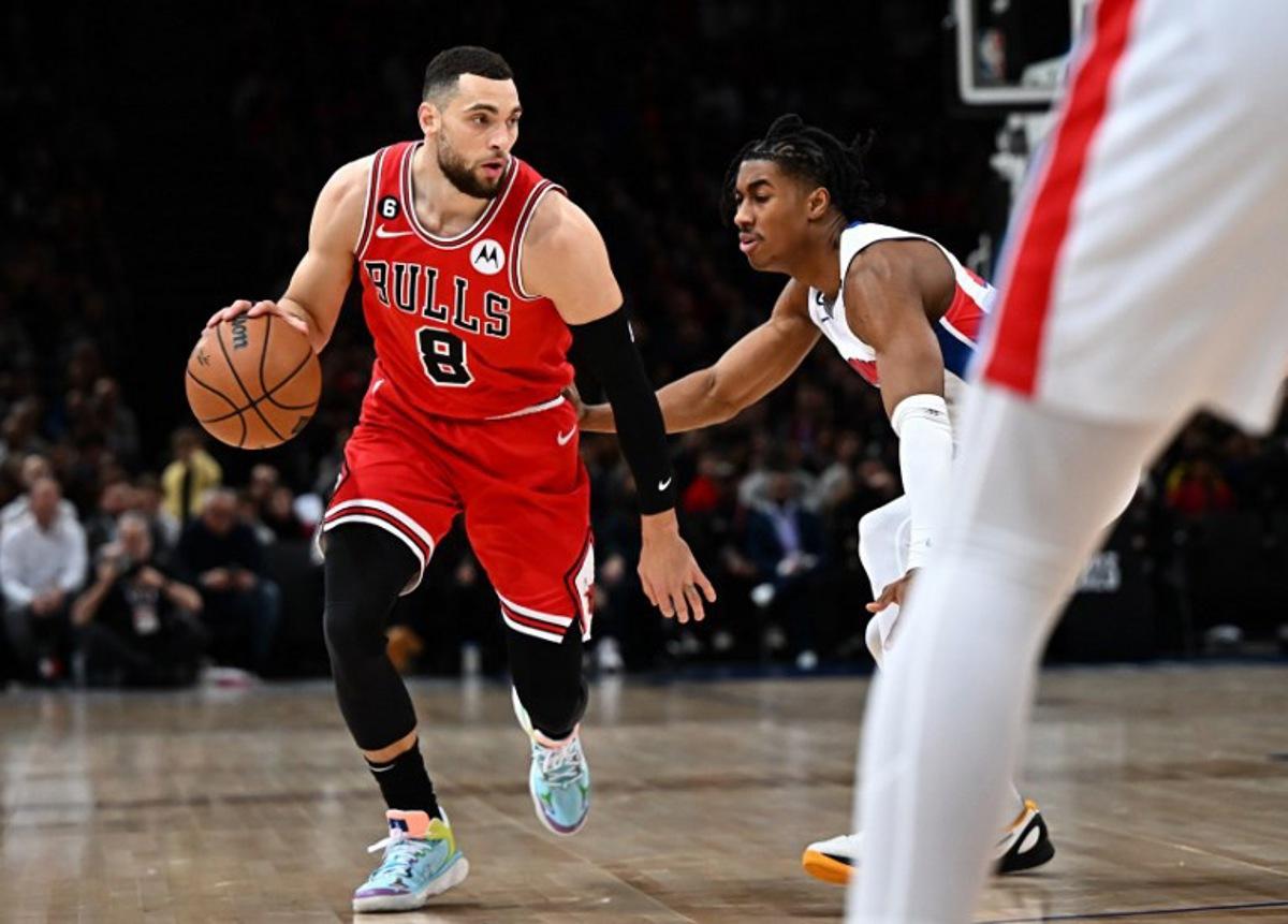 Chicago Bulls' US small forward Zach LaVine runs with the ball during the 2023 NBA Paris Games basketball match between Detroit Pistons and Chicago Bulls at the Arena stadium in Paris on January 19, 2023.  Anne-Christine POUJOULAT / AFP