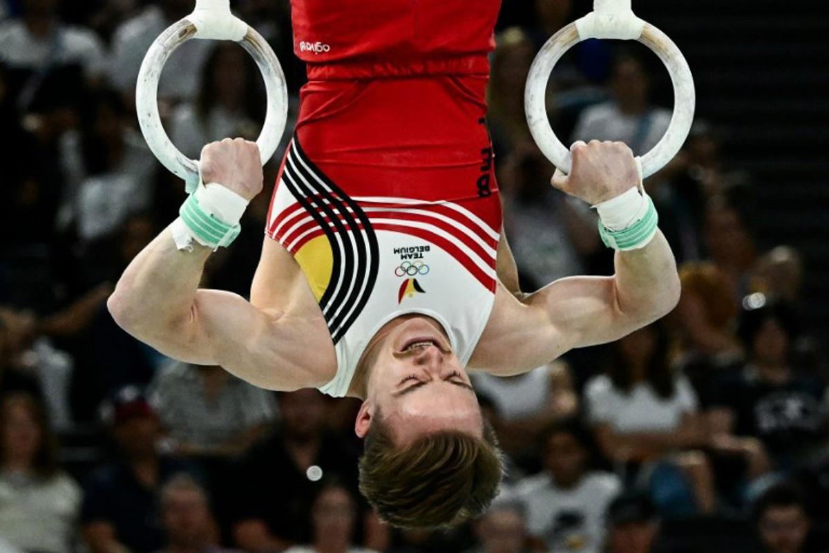 Belgium's Glen Cuyle competes in the artistic gymnastics men's rings final during the Paris 2024 Olympic Games at the Bercy Arena in Paris, on August 4, 2024.  Loic VENANCE / AFP