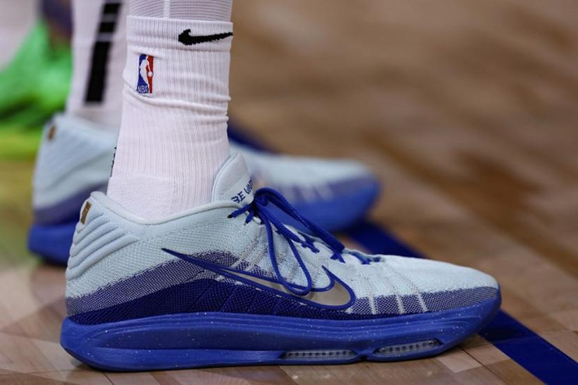 This photograph shows a close up view of the shoes of San Antonio Spurs' French forward-center #01 Victor Wembanyama during the NBA basketball game between the Indiana Pacers and the San Antonio Spurs at the Accor Arena - Palais Omnisports de Paris-Bercy - in Paris on January 23, 2025.  FRANCK FIFE / AFP
