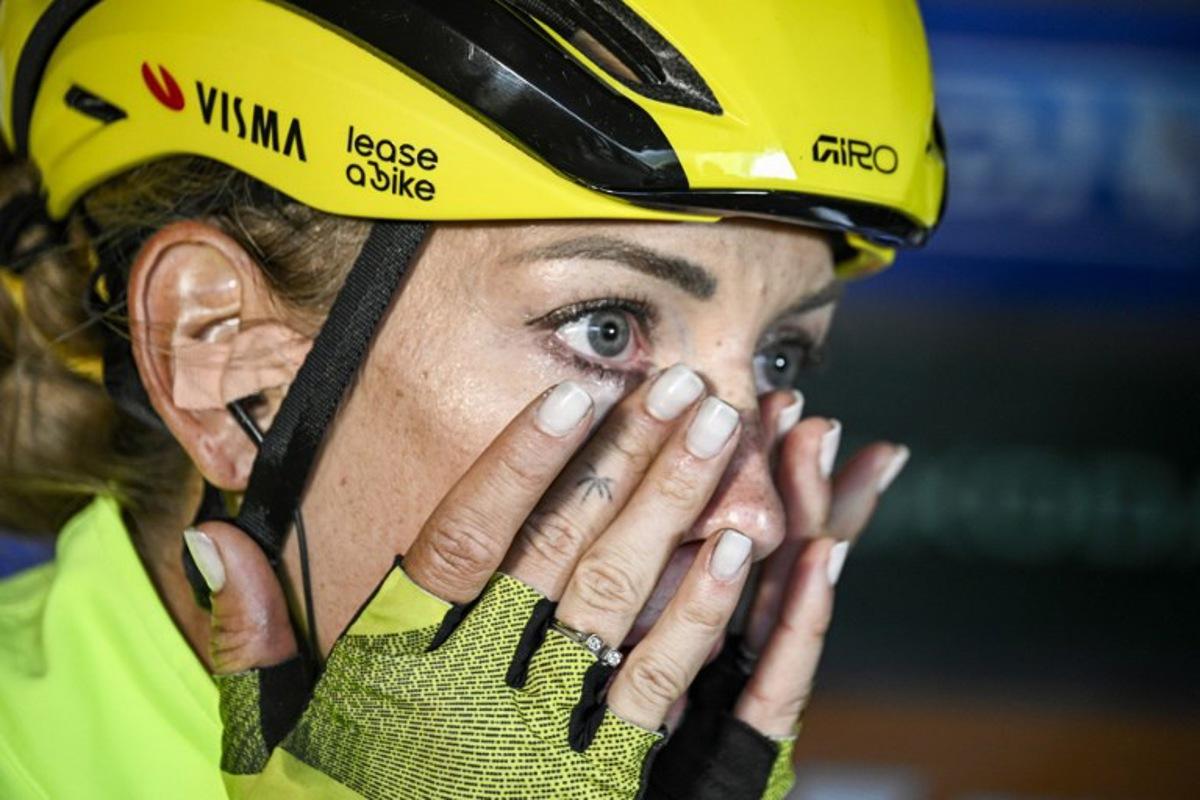 Team Visma | Lease a Bike's French rider Pauline Ferrand-Prevot celebrates after winning the 8th stage (out of 9) of the fourth edition of the Women's Tour de France cycling race, 111.9 km from Chambery to Saint-François-Longchamp, in Saint-François-Longchamp, south-eastern France on August 2, 2025.  JULIEN DE ROSA / AFP