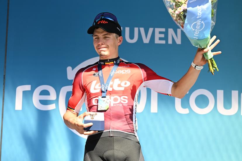 Belgian Arnaud De Lie of Lotto Cycling Team celebrates on the podium after winning the fifth and last stage of the 'Renewi Tour' multi-stage cycling race, 185km from and to Leuven on Sunday 24 August 2025. The five-day race takes place in Belgium and the Netherlands.  BELGA PHOTO DAVID PINTENS