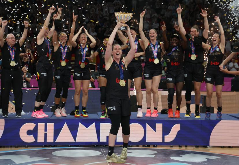 Belgian Cats' players celebrate on the podium after winning a basketball match between Spain and Belgian national team 'the Belgian Cats' on Sunday 29 June 2025 in Piraeus, Greece, the final of the FIBA Women's EuroBasket 2025. BELGA PHOTO VIRGINIE LEFOUR