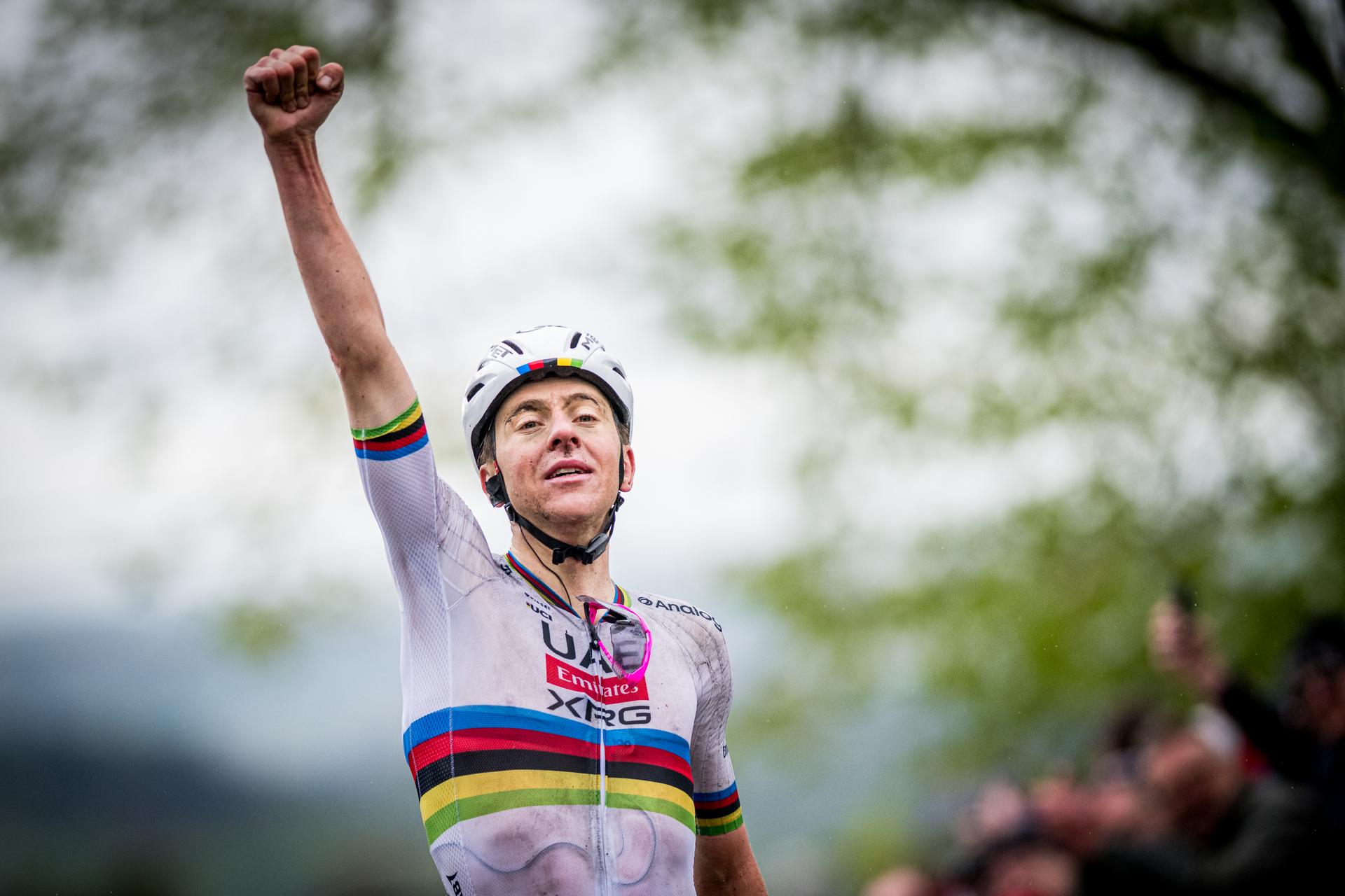 Slovenian Tadej Pogacar of UAE Team Emirates celebrates as he crosses the finish line to win the men's race of the 'La Fleche Wallonne', one day cycling race (Waalse Pijl - Walloon Arrow), 205,2 km from Ciney to Huy, Wednesday 23 April 2025. BELGA PHOTO JASPER JACOBS