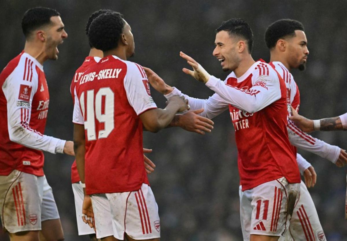 Arsenal's Brazilian midfielder #11 Gabriel Martinelli (2R) celebrates scoring the team's third goal during the English FA Cup third round football match between Portsmouth and Arsenal at Fratton Park in Portsmouth, southern England on January 11, 2026.  Glyn KIRK / AFP