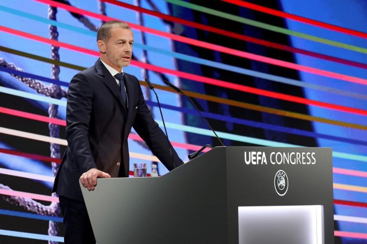UEFA president Aleksander Ceferin addresses the audience during the 49th UEFA ordinary Congress held at the "Sava Centar" congress center in Belgrade on April 3, 2025.  PREDRAG MILOSAVLJEVIC / AFP