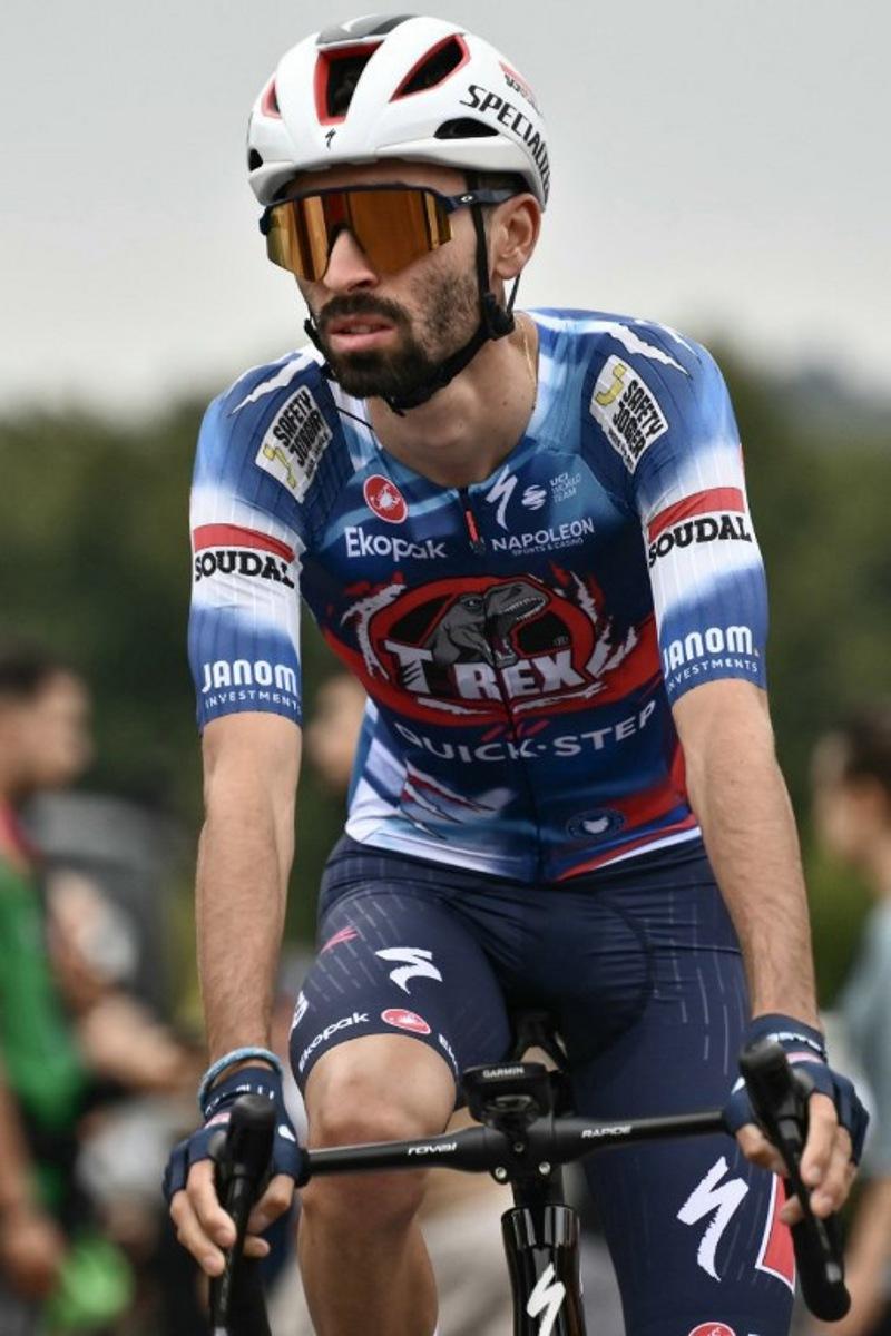 Team Soudal-Quick Step's French rider Valentin Paret-Peintre arrives to compete in the second stage of the Vuelta a Espana, a 159,6 km race between Alba and Limone Piemonte, in Italy's Piemonte region, on August 24, 2025.    Marco BERTORELLO / AFP
