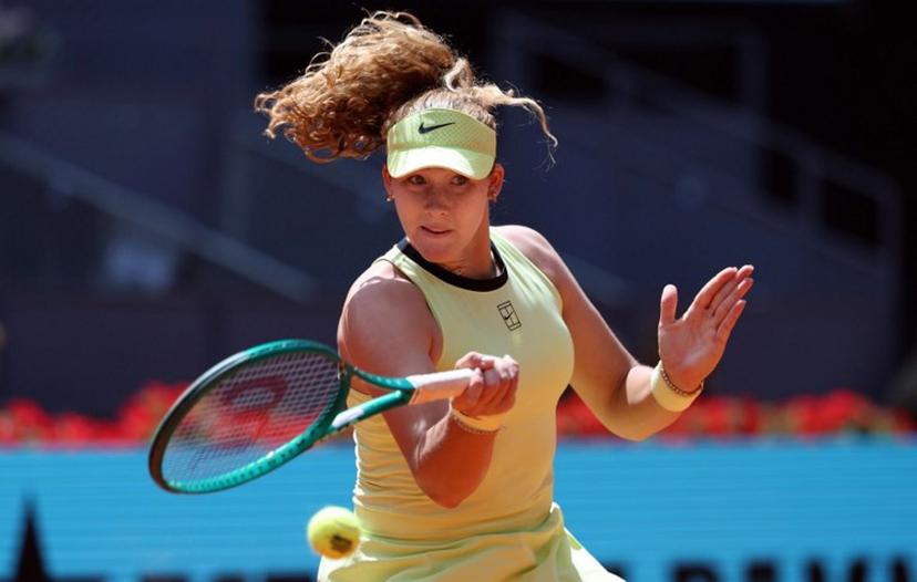 Russia's Mirra Andreeva returns the ball to Canada's Leylah Fernandez during their 2026 WTA Tour Madrid Open tennis tournament women's singles match at the Caja Magica in Madrid, on April 28, 2026.   Thomas COEX / AFP