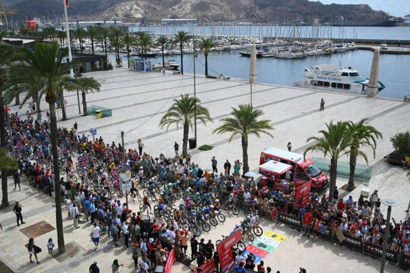 Cyclists ride at the start of the 11th stage of the Vuelta a Espana 2026 cycling tour, a 151,3 km race between Cartagena and Lorca, on September 2, 2026.  JOSE JORDAN / AFP
