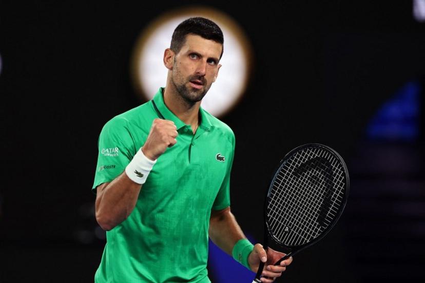 Serbia's Novak Djokovic reacts on a point to Netherlands' Botic van de Zandschulp during their men's singles match on day seven of the Australian Open tennis tournament in Melbourne on January 24, 2026.  Martin KEEP / AFP