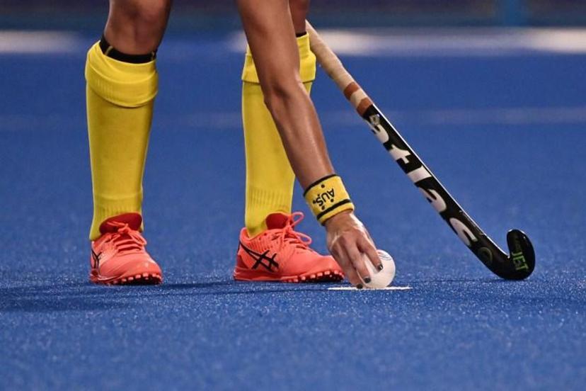 Australia's Kaitlin Nobbs places the ball on the penalty spot during the women's pool B match of the Tokyo 2020 Olympic Games field hockey competition against Japan, at the Oi Hockey Stadium in Tokyo on July 28, 2021.  JEFF PACHOUD / AFP