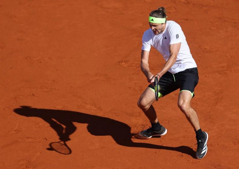 Germany's Alexander Zverev returns a ball to Hungary's Fabian Marozsan during their men's singles semi final match of the ATP Munich Open tennis tournament in Munich, southern Germany on April 19, 2025.  Alexandra BEIER / AFP