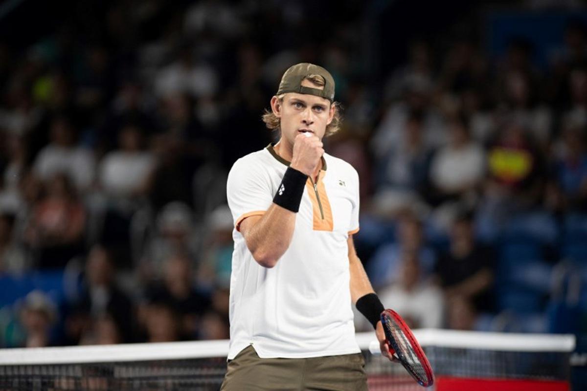Belgium's Zizou Bergs reacts during his men's singles match against Spain's Carlos Alcaraz at the ATP Japan Open tennis tournament in Tokyo on September 27, 2025.  Philip FONG / AFP