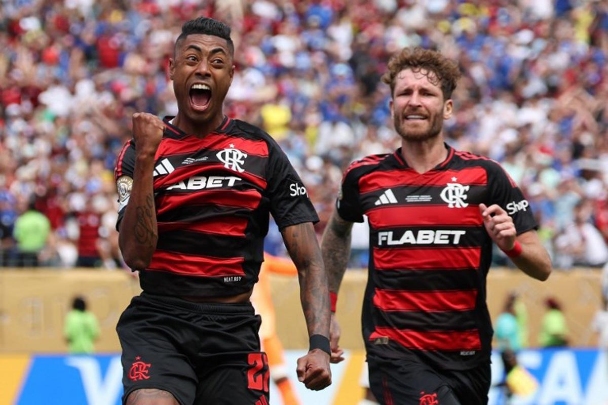 Flamengo's Brazilian forward #27 Bruno Henrique (L) celebrates next to teammate Brazilian defender #04 Leo Pereira after scoring his team's first goal during the FIFA Club World Cup 2025 Group D football match between Brazil's CR Flamengo and England's Chelsea at the Lincoln Financial Field stadium in Philadelphia on June 20, 2025.  FRANCK FIFE / AFP