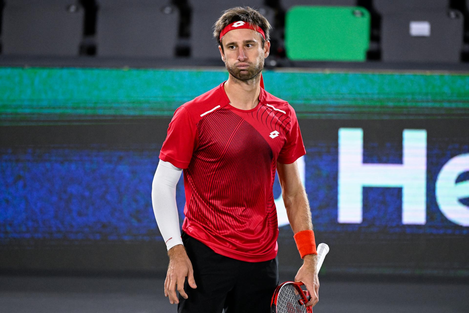Belgian Sander Gille looks dejected during a double match between German pair Krawietz/Puetzand and Belgian Gille/ Vliegen, the third game between the Belgian team and Germany, in Group C of the group stage of the 2022 Davis Cup finals, Friday 16 September 2022, in Hamburg, Germany. Belgium will compete from 13 to 18 September against Australia, Germany and France in Group C. BELGA PHOTO LAURIE DIEFFEMBACQ
