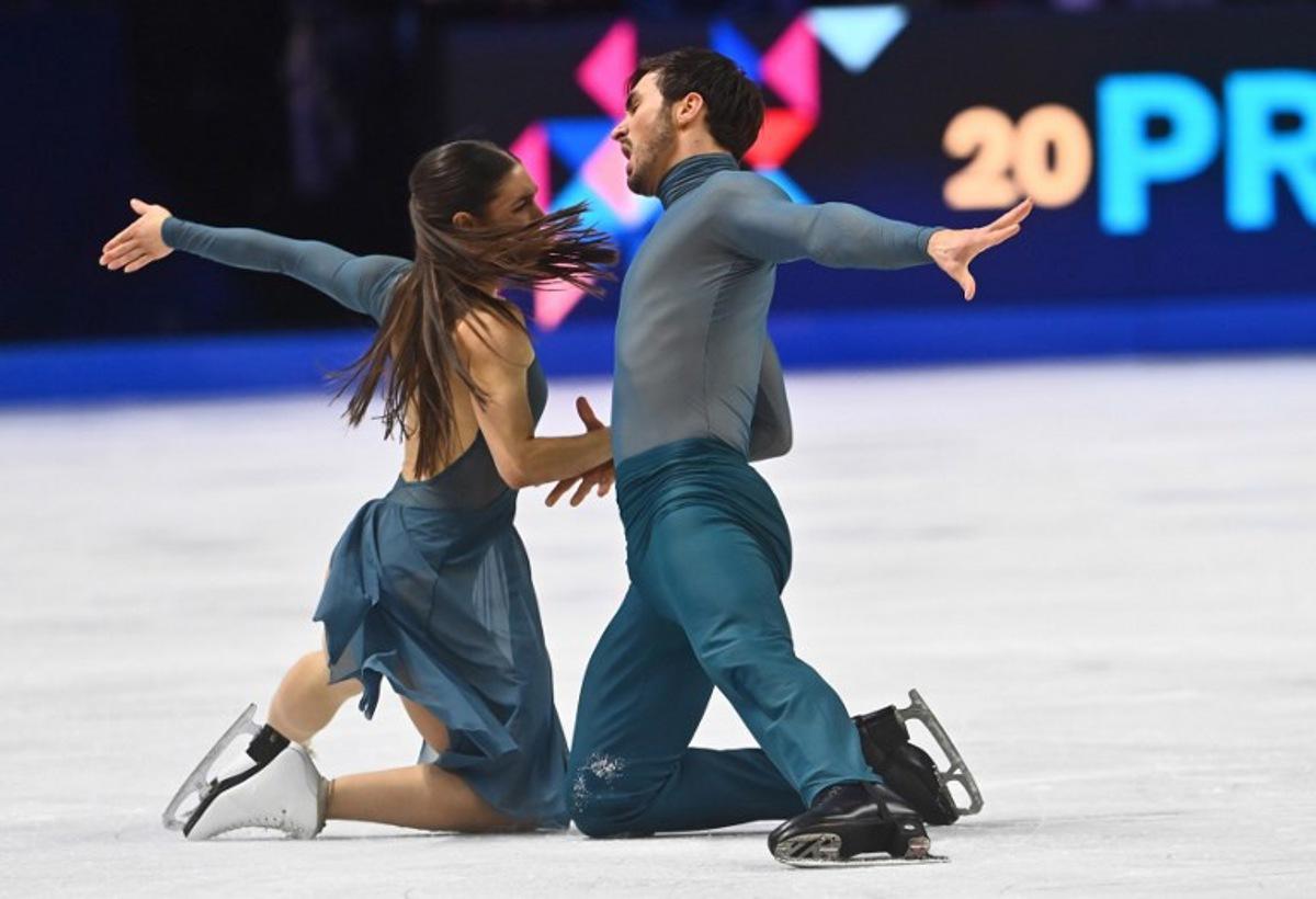 France's Laurence Fournier Beaudry and Guillaume Cizeron perform during the Ice Dance Free Dance program of the 2026 ISU Figure Skating World Championships in Prague, Czech Republic on March 28, 2026.  Michal Cizek / AFP