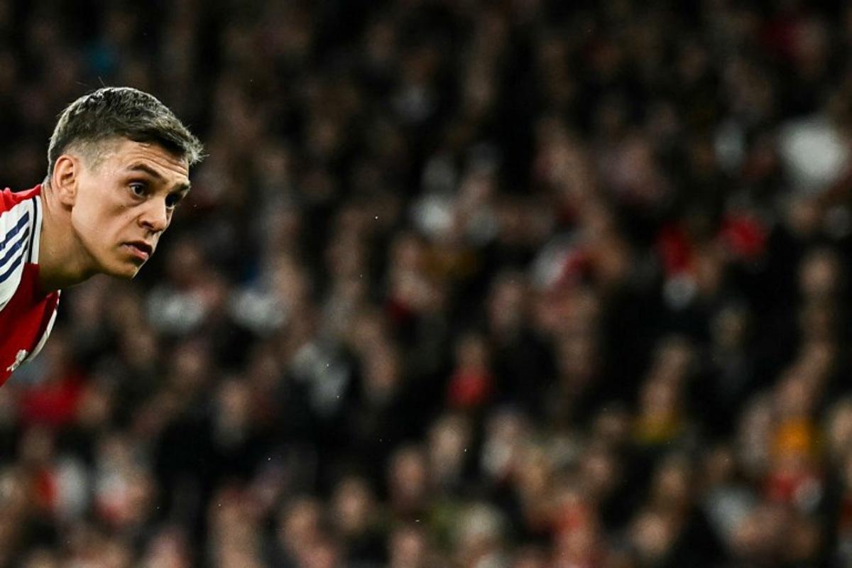 Arsenal's Belgian midfielder #19 Leandro Trossard reacts after scoring his team second goal during the English Premier League football match between Arsenal and Crystal Palace at the Emirates Stadium in London on April 23, 2025.   Ben STANSALL / AFP