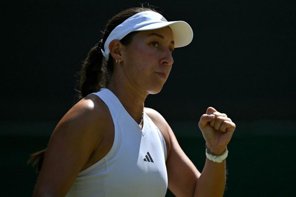 US player Jessica Pegula celebrates winning the second set against US player Iva Jovic during their women's singles round of sixteen tennis match on the seventh day of the 2026 Wimbledon Championships at The All England Lawn Tennis and Croquet Club in Wimbledon, southwest London, on July 5, 2026.  Glyn KIRK / AFP