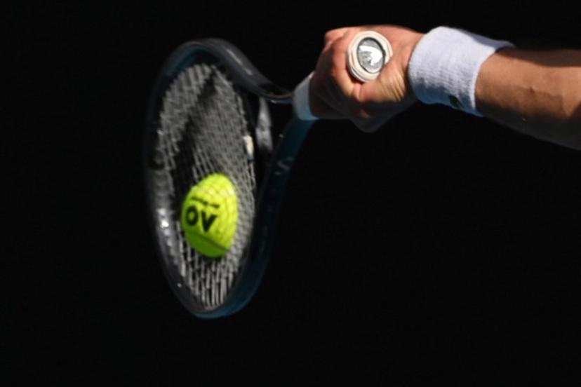 Serbia's Novak Djokovic hits a return against USA's Taylor Fritz during their men's singles quarter-final match on day 10 of the Australian Open tennis tournament in Melbourne on January 23, 2024.  Paul Crock / AFP