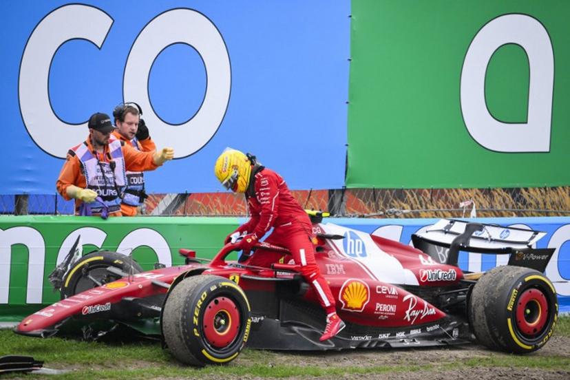 Ferrari's British driver Lewis Hamilton exits his car after crashing during the Formula One Dutch Grand Prix at The Circuit Zandvoort, western Netherlands, on August 31, 2025.  JOHN THYS / AFP