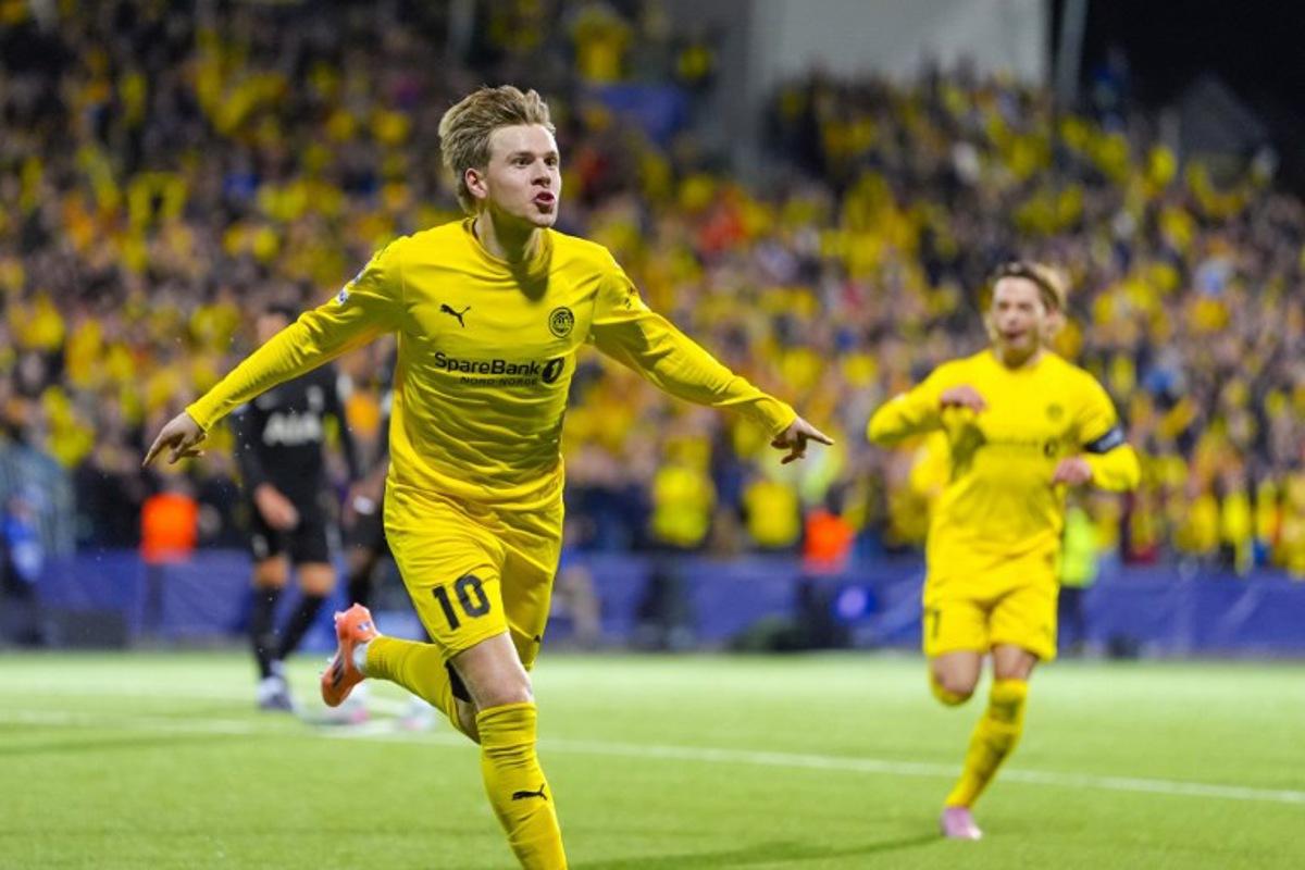 Bodoe/Glimt's Norwegian forward #23 Jens Petter Hauge celebrates scoring during the UEFA Champions League, League Phase - Matchday 2 football match between Bodoe/Glimt and Tottenham Hotspur in Bodoe, Norway on September 30, 2025.  Lise Åserud / NTB / AFP
