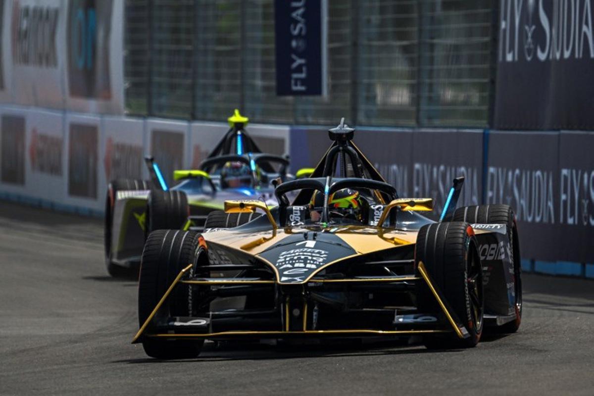 DS Penske's Formula E Belgian driver Stoffel Vandoorne (front) competes in the qualifying of the Formula E race at the Jakarta International e-Prix Circuit in Jakarta on June 3, 2023.  BAY ISMOYO / AFP