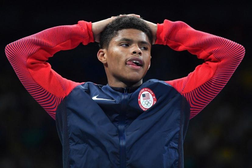 USA's Shakur Stevenson poses on the podium with a medal during the Rio 2016 Olympic Games at the Riocentro - Pavilion 6 in Rio de Janeiro on August 20, 2016.    Yuri CORTEZ / AFP
