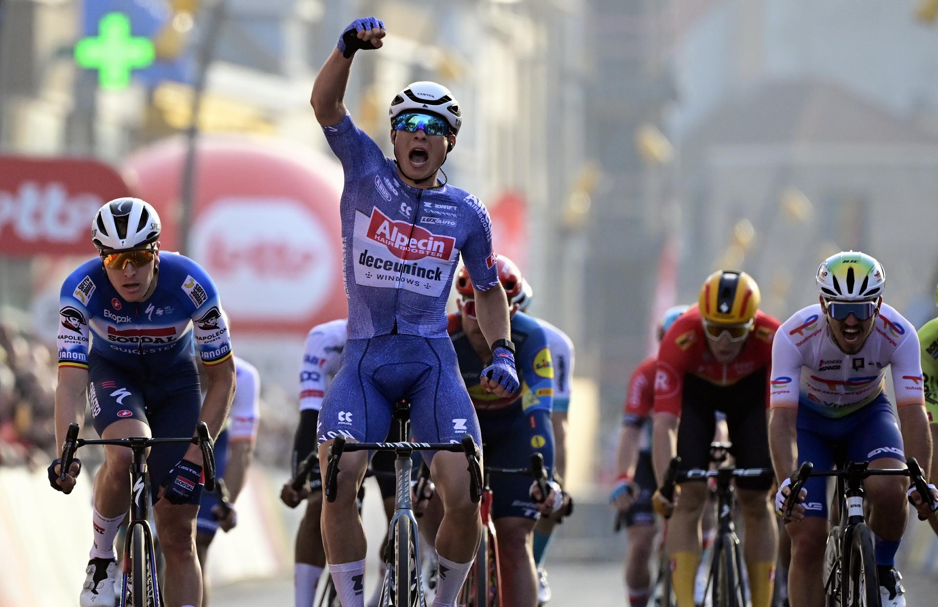 Belgian Jasper Philipsen of Alpecin-Deceuninck celebrates after winning the 'Classic Brugge-De Panne' men's elite one-day cycling race, 198,9 km from Brugge to De Panne, Wednesday 20 March 2024. BELGA PHOTO DIRK WAEM