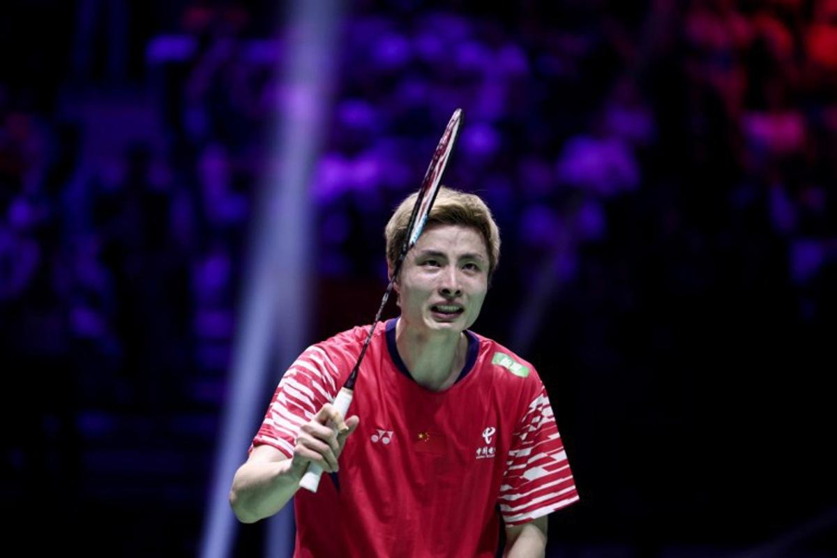 China's Shi Yuqi reacts after winning the men's singles final match against Thailand's Kunlavut Vitidsarn at the Badminton BWF World Championships at the Adidas Arena in Paris, on August 31, 2025.  Thibaud MORITZ / AFP