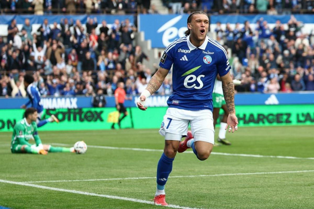 Strasbourg's Belgian-Portuguese forward #07 Diego Moreira celebrates after scoring a goal during the French L1 football match between RC Strasbourg Alsace and AS Saint-Etienne at Stade de la Meinau in Strasbourg, north-eastern France on April 26, 2025.   Frederick FLORIN / AFP