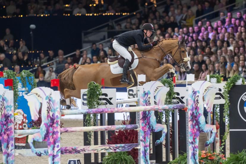 Rider Jos Verlooy and horse Renshaw van't Meulenhof are pictured during the FEI World Cup Jumping competition at the "Vlaanderens Kerstjumping" equestrian event in Mechelen on Tuesday 30 December 2025. BELGA PHOTO JONAS ROOSENS