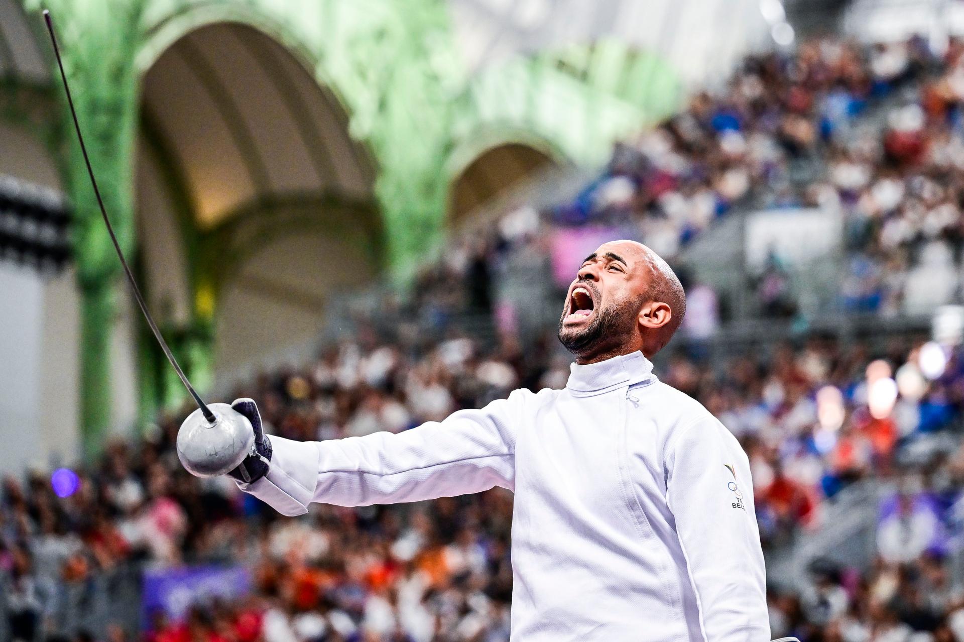 Belgian fencer Neisser Loyola celebrates after winning his fencing bout against Swiss Bayard, in the table of 32 of the men's epee individual competition at the Paris 2024 Olympic Games, on Sunday 28 July 2024 in Paris, France. The Games of the XXXIII Olympiad are taking place in Paris from 26 July to 11 August. The Belgian delegation counts 165 athletes competing in 21 sports. BELGA PHOTO DIRK WAEM