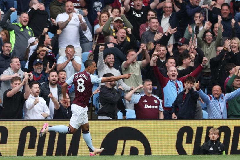 Aston Villa's Belgian midfielder #08 Youri Tielemans celebrates after scoring the opening goal during the English Premier League football match between Aston Villa and Fulham at Villa Park in Birmingham, central England on May 3, 2025.  Adrian Dennis / AFP