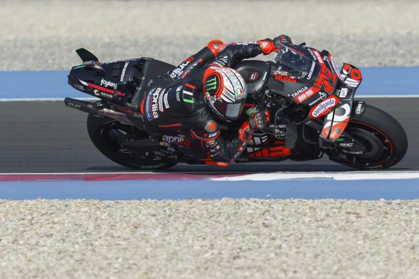 Aprilia Racing's Italian rider Marco Bezzecchi drives during the second free practice session of the Qatar MotoGP Grand Prix at the Lusail International Circuit in Lusail, north of Doha, on April 12, 2025.   Karim JAAFAR / AFP