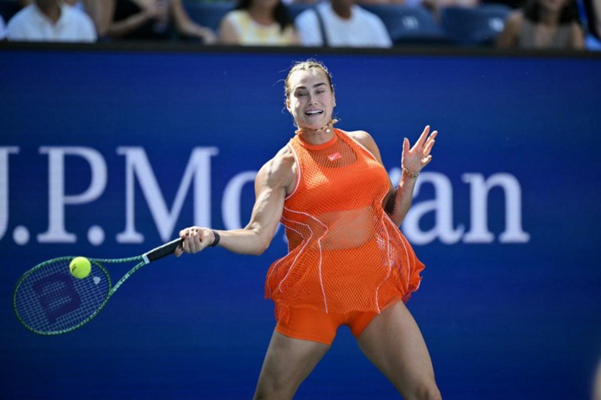 Belarus's Aryna Sabalenka hits a return against Uzbekistan's Kamilla Rakhimova during their women's singles third round tennis match on day six of the US Open tennis tournament at the USTA Billie Jean King National Tennis Center in New York City on September 4, 2026.  ANGELA WEISS / AFP