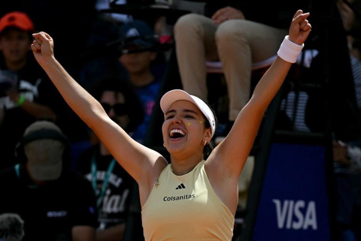 Colombia's Camila Osorio celebrates winning the WTA Bogota 2025 women's singles final match against Poland's Katarzyna Kawa in Bogota on April 6, 2025.   Luis ACOSTA / AFP