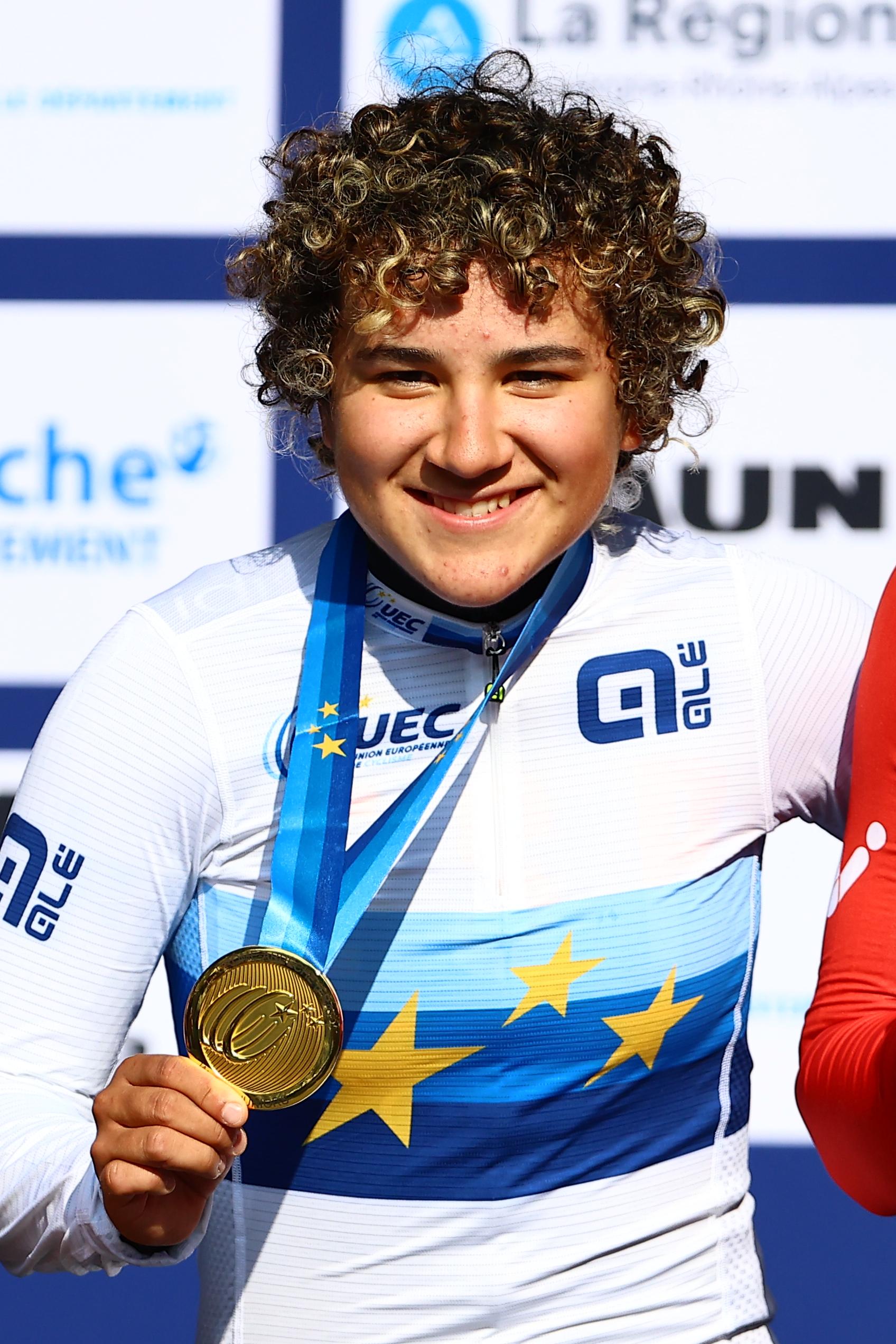 Spanish Paula Ostiz celebrates on the podium with her gold medal after winning the 12,2 km time trial of the Women junior category at the UEC road European cycling championships, Wednesday 01 October 2025, in Loriol-sur-Drome, France. The European cycling championships Drome-Ardeche takes place from 1 to 5 October, France. BELGA PHOTO DAVID PINTENS