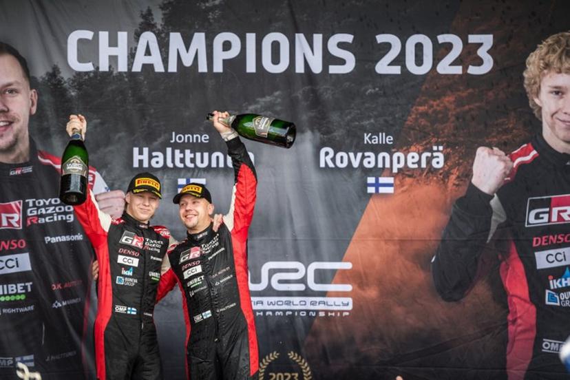 Finland's driver Kalle Rovanpera (L) and co-driver Jonne Halttunen of Toyota Gazoo Racing WRT celebrate after the stage (SS 18 Wolf Powerstage Passauer Land 2) of the WRC Central European Rally 2023 near Passau, southern Germany on October 29, 2023. Kalle Rovanpera sealed his second straight world rally title. The 23-year-old Finn finished second to Thierry Neuville in the Central European Rally to take an unassailable lead in the standings with one round of the season remaining. Michal Cizek / AFP