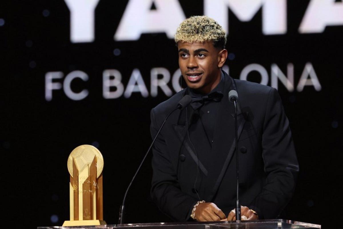Barcelona's Spanish forward Lamine Yamal speaks after receiving the Kopa Trophy for the best under-21 player during the 2025 Ballon d'Or France Football award ceremony at the Theatre du Chatelet in Paris on September 22, 2025.  Franck FIFE / AFP